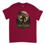 Red t-shirt with a graphic of Bigfoot holding an American flag and '250 Years of Freedom' text on a white background.