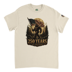 Sand t-shirt with a Bigfoot graphic holding an American flag and '250 Years of Freedom' text on a white background.