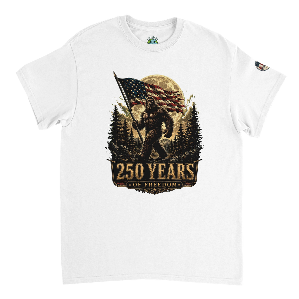 White t-shirt with a graphic of Bigfoot holding an American flag and '250 Years of Freedom' text on a white background.