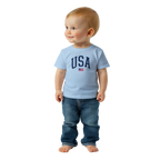 Child wearing a light blue 'USA' t-shirt and jeans on a white background