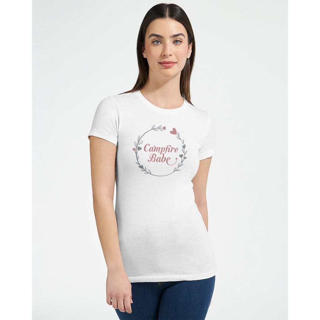 Woman wearing a white t-shirt with 'Campfire Baby' design on a plain background