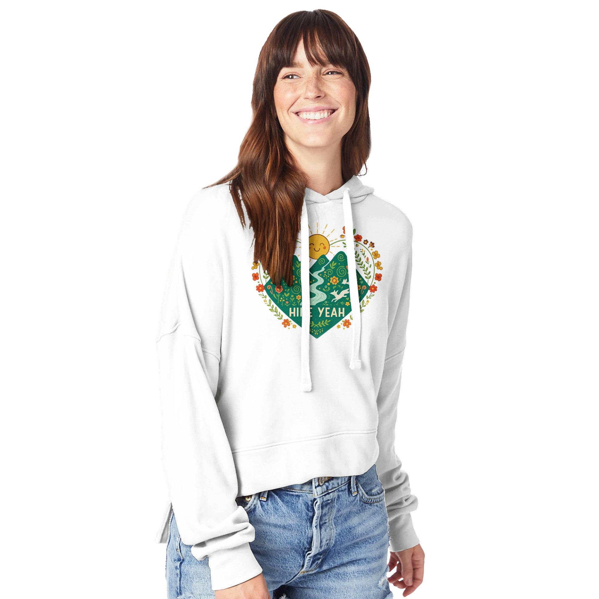 Woman wearing a white hoodie with a graphic design on a white background