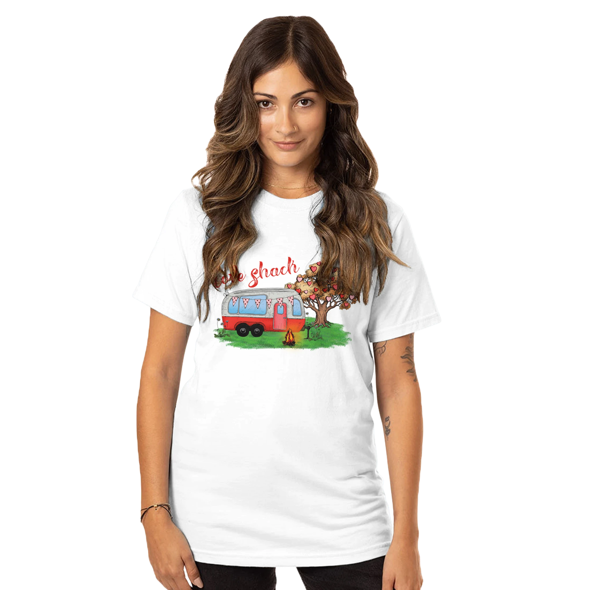 Woman wearing a white t-shirt from the Love Collection with a graphic design on a white background